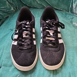 Black Sneakers with White Stripes